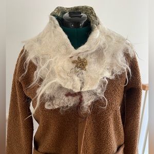 A striking handmade scarf made of wool from a rescue farm